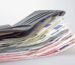 Kambiyo senetlerine özgü takip: Cüzdan içinde deste halinde çeşitli banknotlar